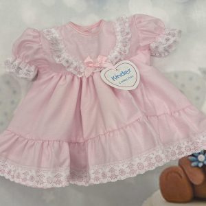Kinder baby dress with dobby spot and daisy trim